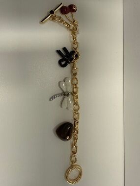 Coach gold-tone Charm Bracelet with White Dragonfly and Brown Heart